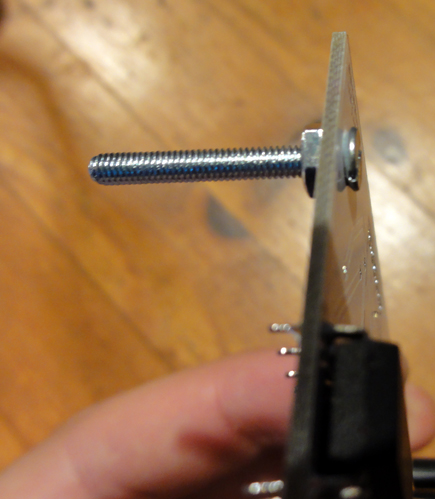 tighten a bolt on the other side